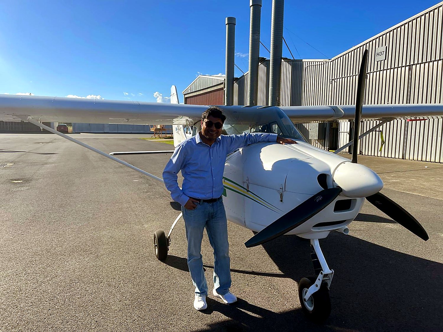 Dr Ajay Koshti with an aircraft