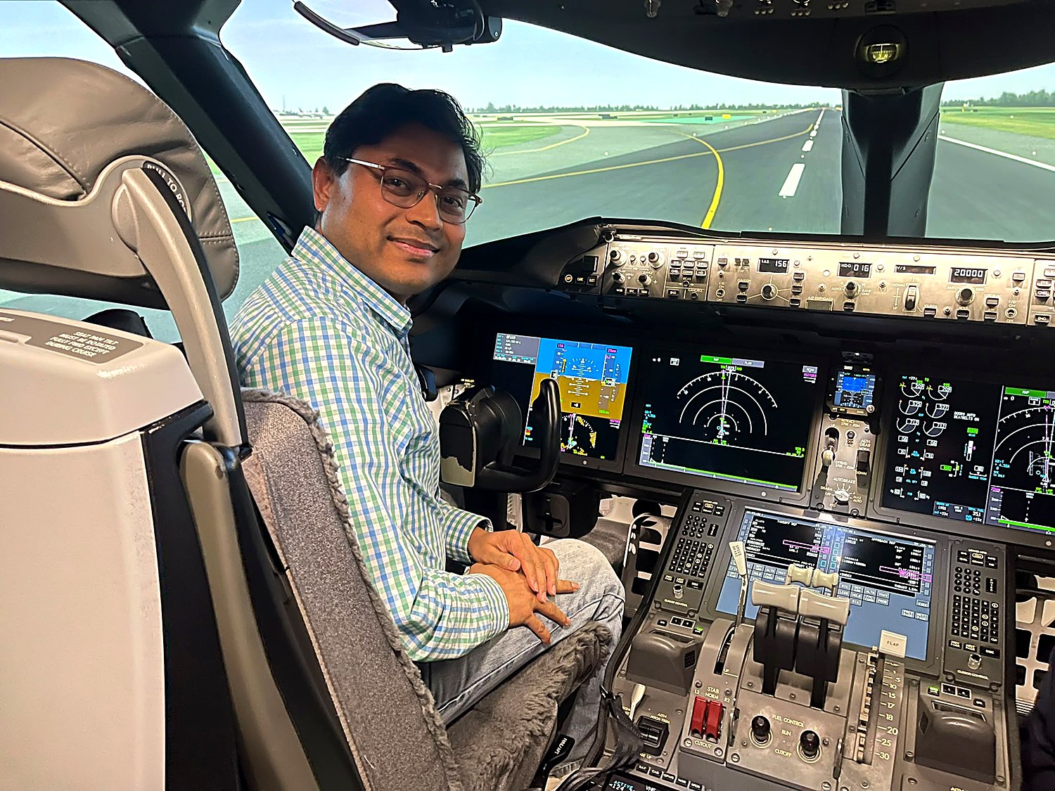 Dr Ajay Koshti in a flight simulator